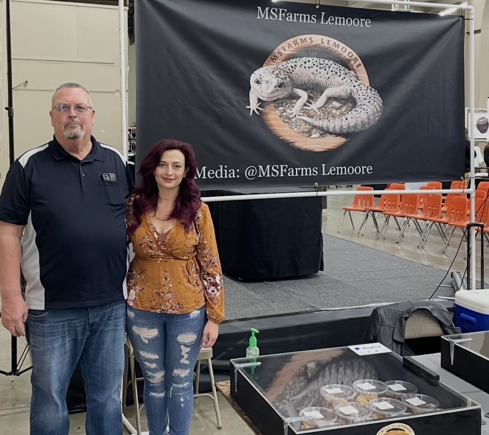 Current image: Micah and Bill setting up the MS Farms Exotics booth at a reptile show.
