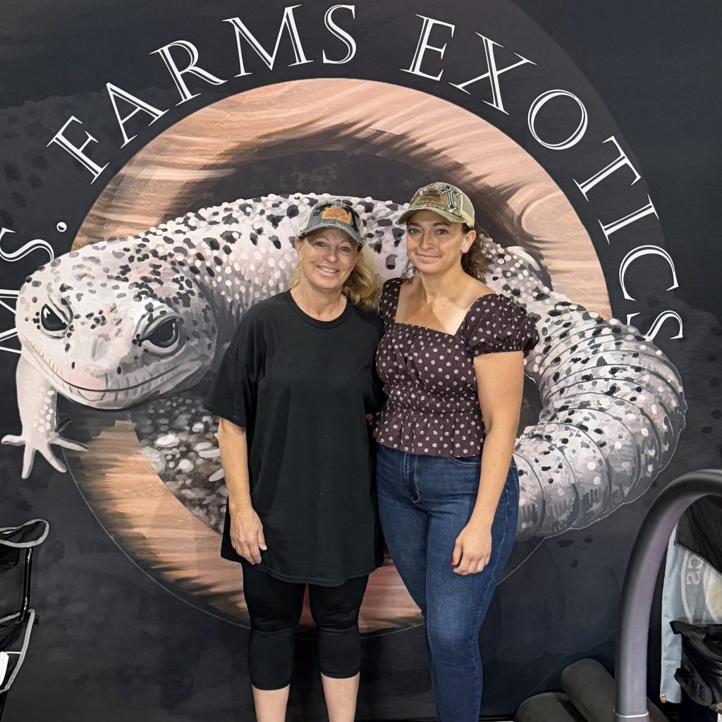 The Smiths at the LA Pet Fair in 2026 standing in front of the MS Farms Exotics banner.